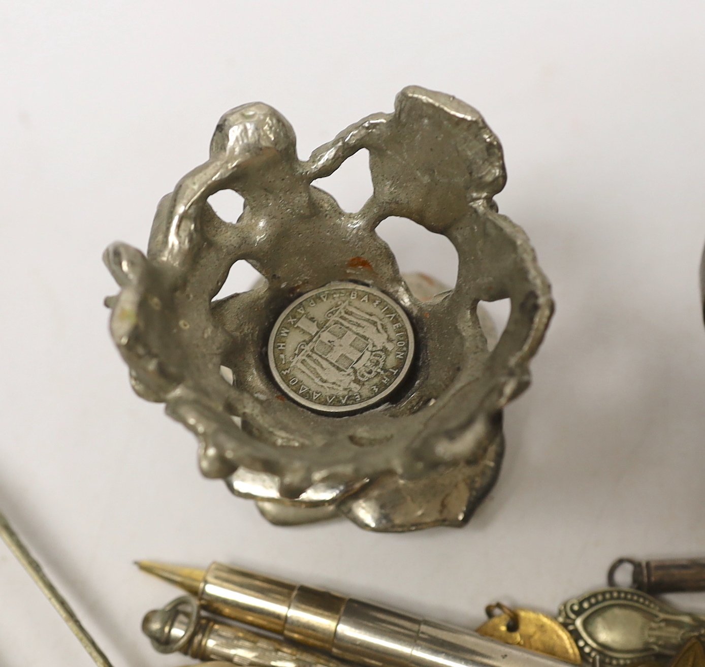 An Edwardian silver mounted travelling watch case, Birmingham, 1903, 11.4cm, and other items including plated flatware, coins and a group of propelling pencils including Sampson Mordan & Co, etc.